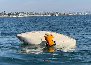 Coast Guard rescues man from capsized vessel