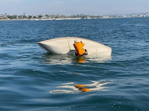 Coast Guard rescues man from capsized vessel