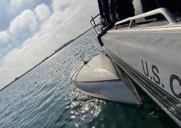 Coast Guard rescues man from capsized vessel