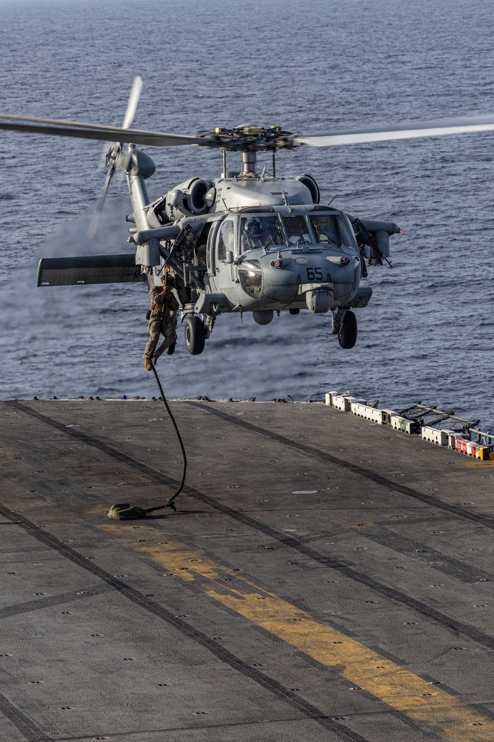 U.S. Marines Conduct a Fast Rope Evolution aboard the USS Iwo Jima