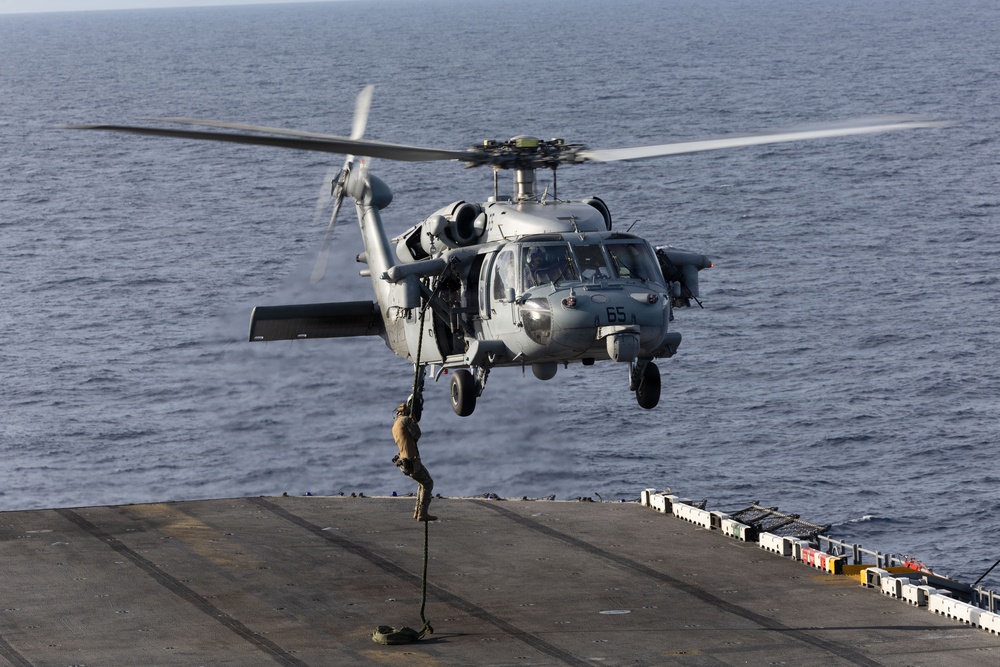 U.S. Marines Conduct a Fast Rope Evolution aboard the USS Iwo Jima