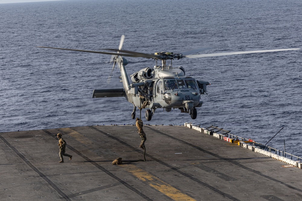 U.S. Marines Conduct a Fast Rope Evolution aboard the USS Iwo Jima