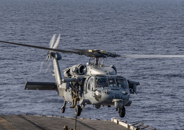 U.S. Marines Conduct a Fast Rope Evolution aboard the USS Iwo Jima