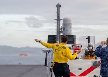U.S. Marines, Sailors and JMSDF members carry out a flight deck operation rehearsal