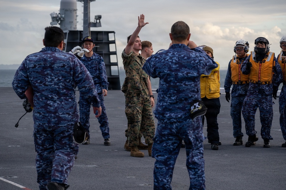 U.S. Marines, Sailors and JMSDF members carry out a flight deck operation rehearsal