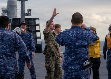U.S. Marines, Sailors and JMSDF members carry out a flight deck operation rehearsal
