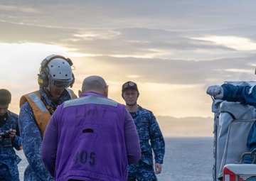 U.S. Marines, Sailors and JMSDF members carry out a flight deck operation rehearsal