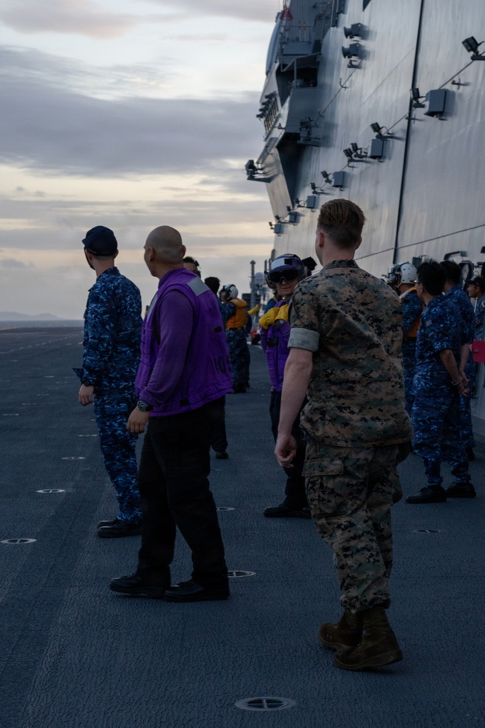 U.S. Marines, Sailors and JMSDF members carry out a flight deck operation rehearsal