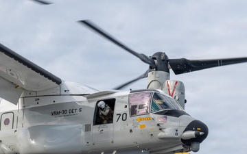 U.S. Sailors and JMSDF members conduct flight operations aboard the JS Kaga
