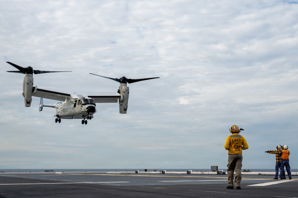U.S. Sailors and JMSDF members conduct flight operations aboard the JS Kaga