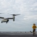 U.S. Sailors and JMSDF members conduct flight operations aboard the JS Kaga