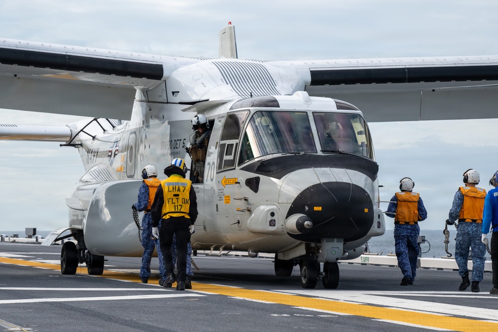 U.S. Sailors and JMSDF members conduct flight operations aboard the JS Kaga