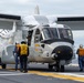 U.S. Sailors and JMSDF members conduct flight operations aboard the JS Kaga
