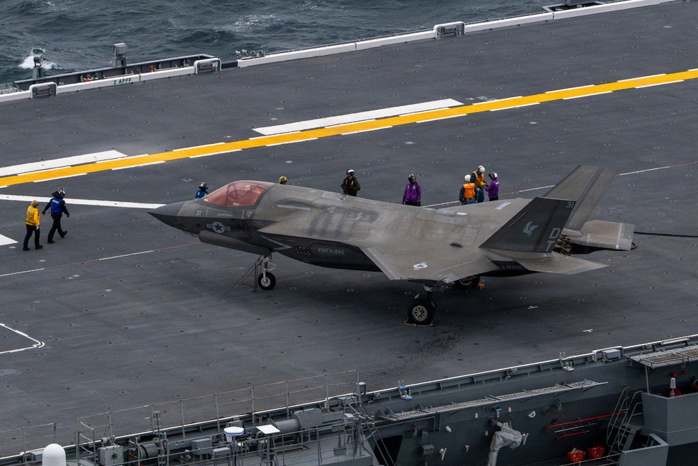 U.S. Marines, Sailors and JMSDF members conduct flight operations aboard the JS Kaga