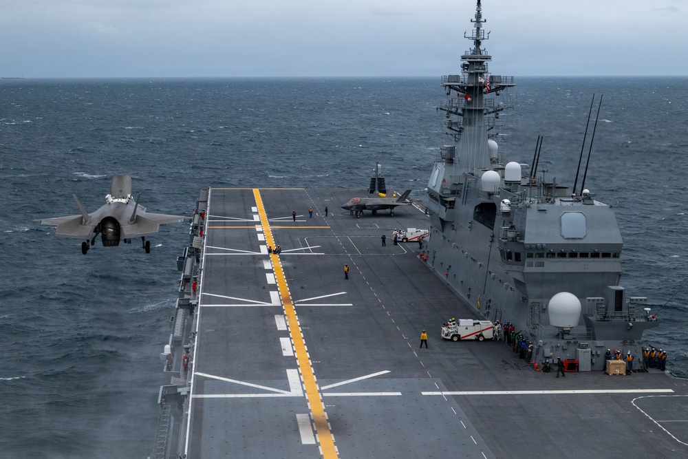 U.S. Marines, Sailors and JMSDF members conduct flight operations aboard the JS Kaga