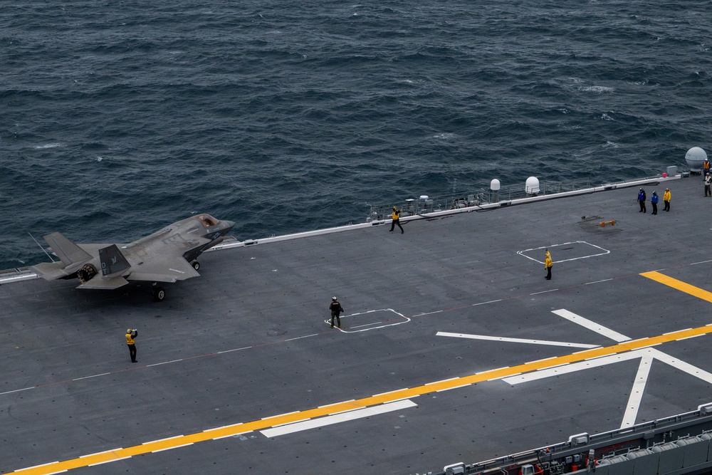 U.S. Marines, Sailors and JMSDF members conduct flight operations aboard the JS Kaga