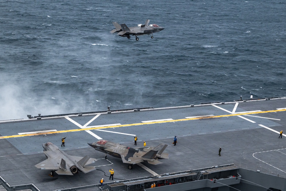 U.S. Marines, Sailors and JMSDF members conduct flight operations aboard the JS Kaga