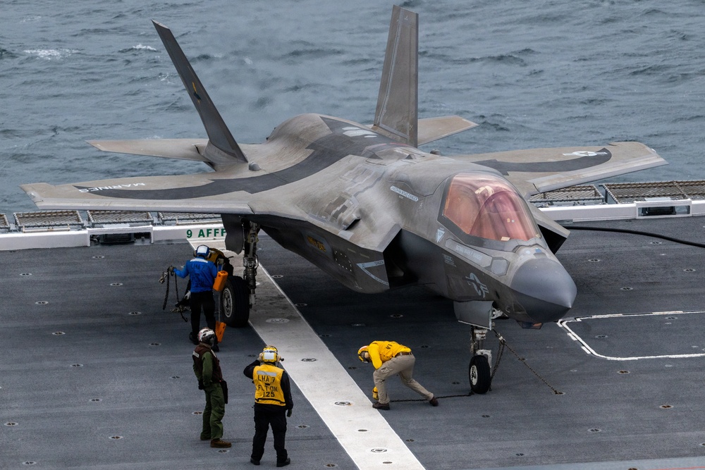 U.S. Marines, Sailors and JMSDF members conduct flight operations aboard the JS Kaga