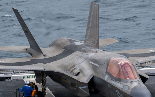 U.S. Marines, Sailors and JMSDF members conduct flight operations aboard the JS Kaga