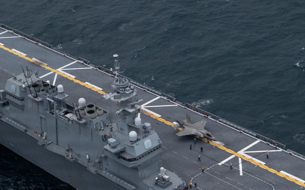 U.S. Marines, Sailors and JMSDF members conduct flight operations aboard the JS Kaga