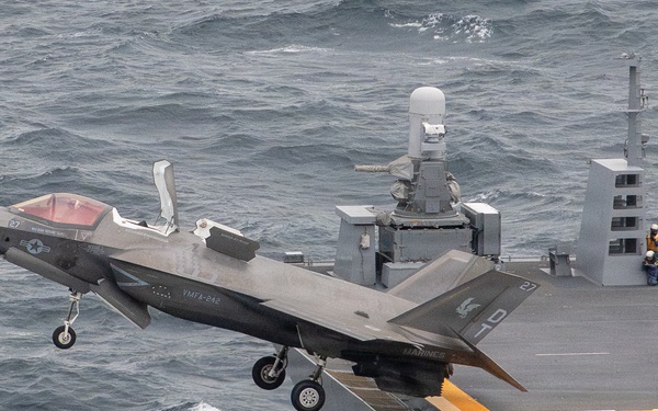 U.S. Marines, Sailors and JMSDF members conduct flight operations aboard the JS Kaga
