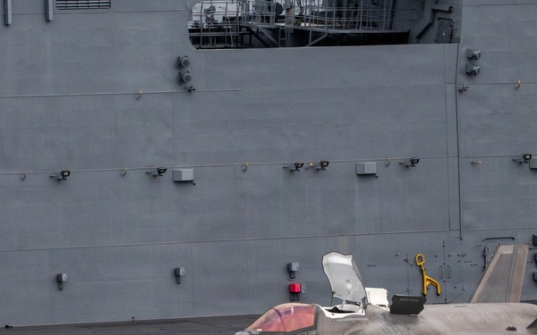 U.S. Marines, Sailors and JMSDF members conduct flight operations aboard the JS Kaga