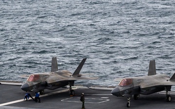 U.S. Marines, Sailors and JMSDF members conduct flight operations aboard the JS Kaga