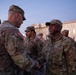 Mississippi National Guard service members receive coins during a promotion ceremony in front of the U.S. Capitol