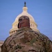 Lt. Col. Steven Jackson talks to service members during a promotion ceremony in front of the U.S. Capitol