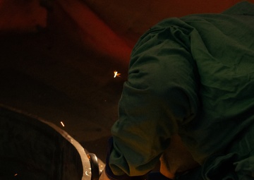 Ronald Reagan Sailors Work With Contractors to Prepare the Mast and Island