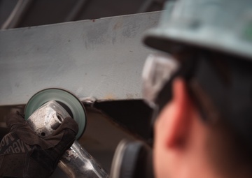 Ronald Reagan Sailors Work With Contractors to Prepare the Mast and Island