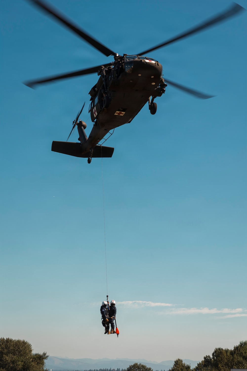 Washington National Guard dustoff crew trains for high-rise disasters with Seattle Fire rescue team