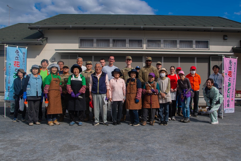 Yokota Airmen bring Fall flowers to Fussa City