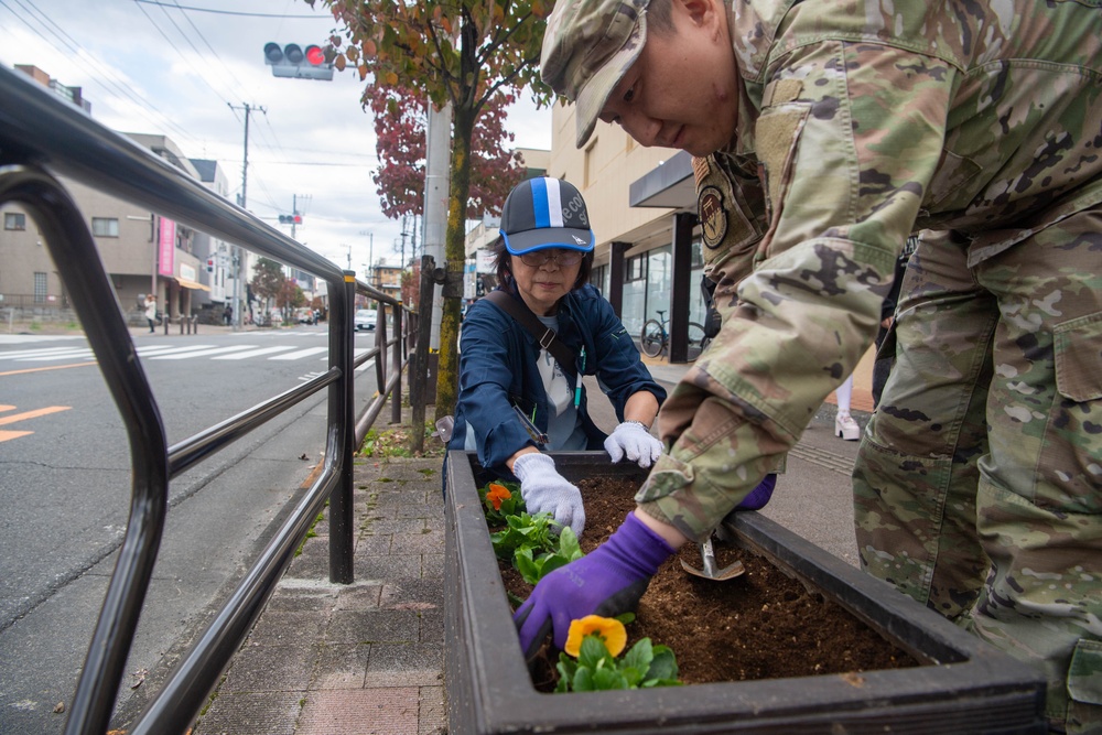Yokota Airmen bring Fall flowers to Fussa City
