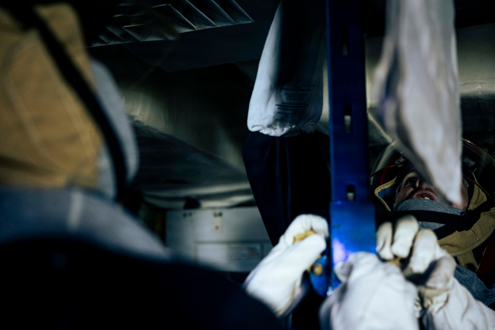 USS Iwo Jima Sailors Conduct a Damage Control Drill