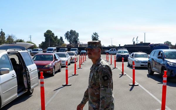 California National Guard Service Members Help Distribute Food Kits In Support of CAPK In Bakersfield, Calif.