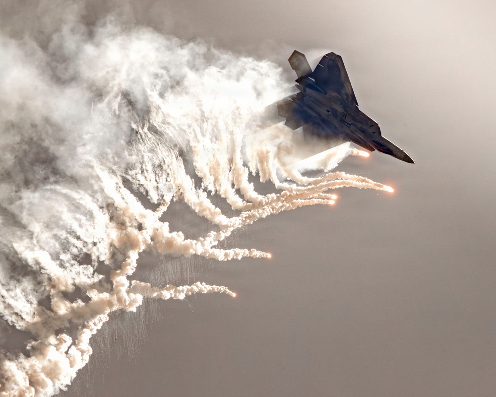 Trail of Fire: F-22 Raptor Flare Dump Over Miramar