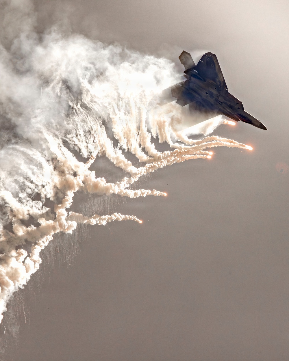 Trail of Fire: F-22 Raptor Flare Dump Over Miramar