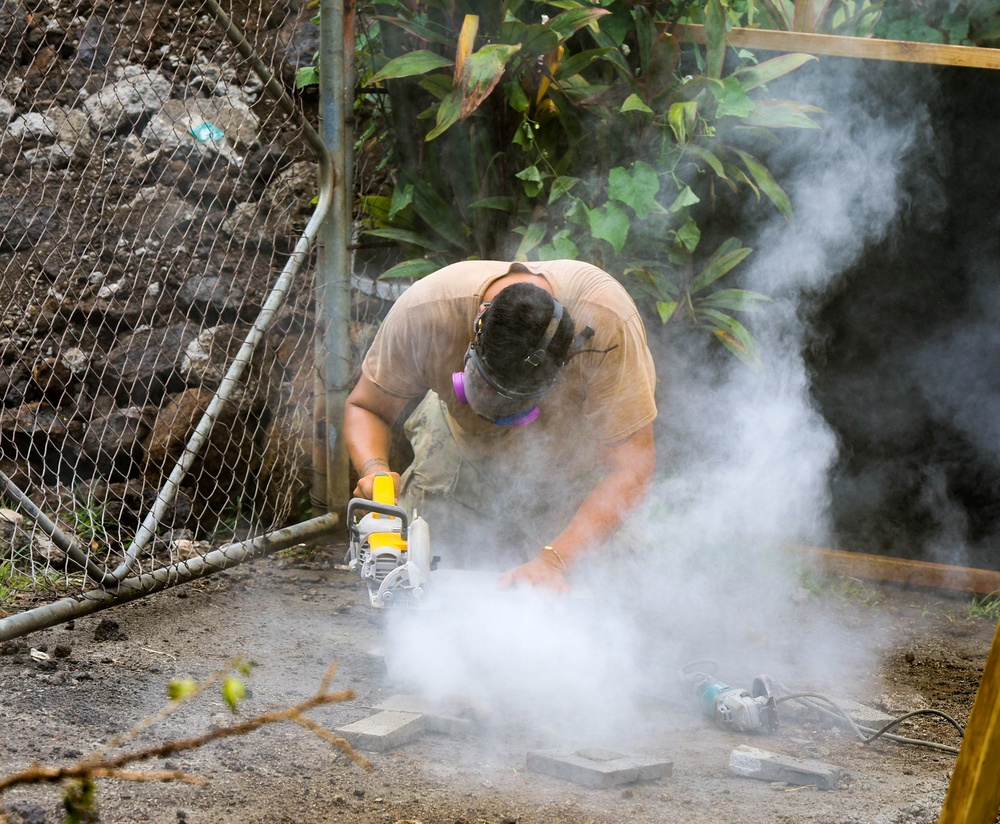 Naval Moblie Construction Battalion (NMCB) 4 conducts repairs at Maagiagi Elementary School