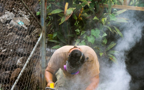 Naval Moblie Construction Battalion (NMCB) 4 conducts repairs at Maagiagi Elementary School