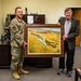Retired Weapons School officer donates painting of former Chief of Staff piloting F-4 Phantom II to 57th Wing