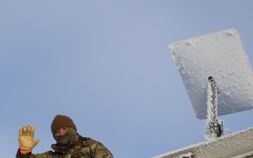 AKOM members install communication equipment during Operation Halong Response