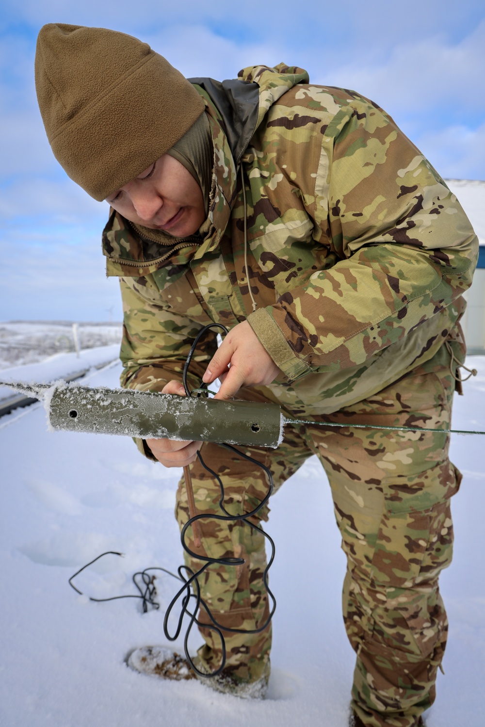AKOM members install communication equipment during Operation Halong Response