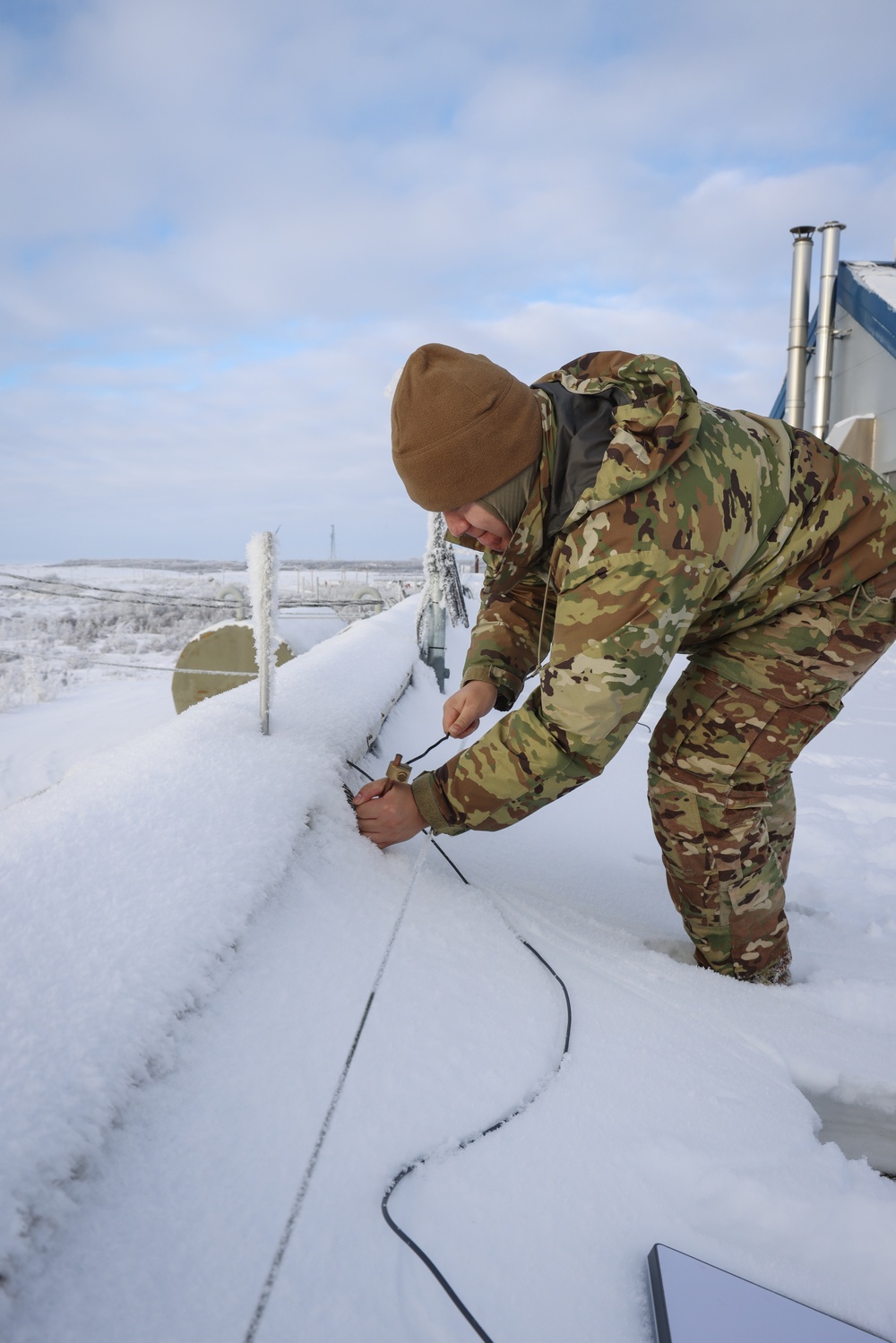 AKOM members install communication equipment during Operation Halong Response