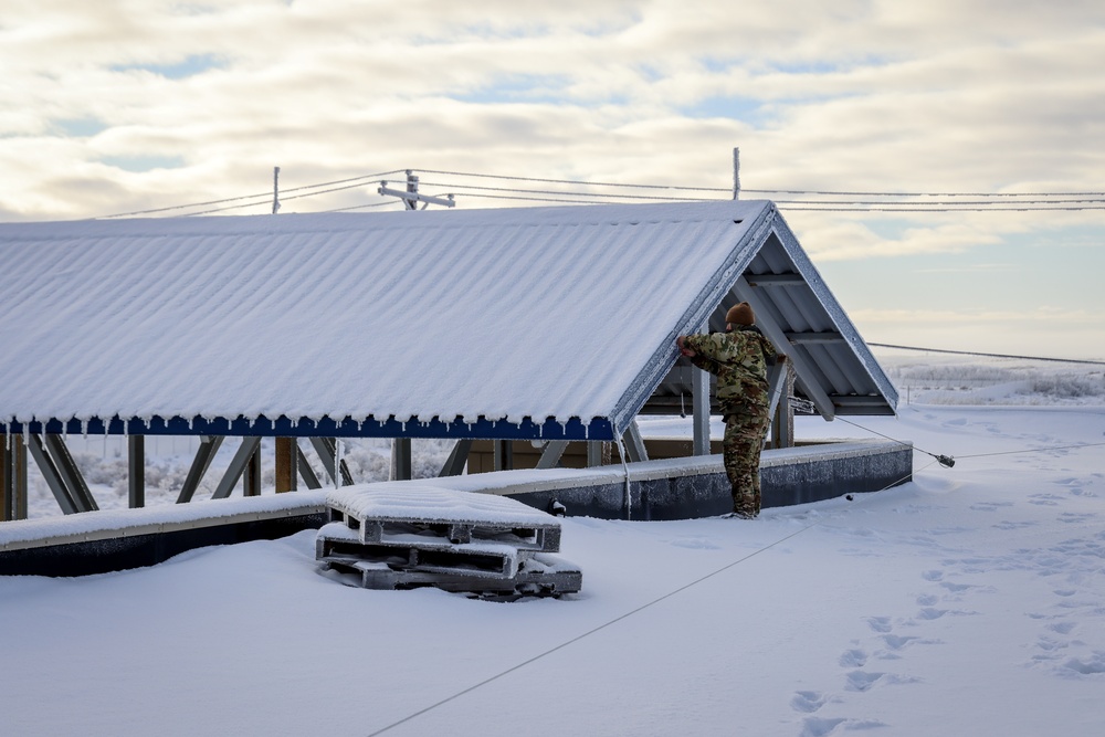 AKOM members install communication equipment during Operation Halong Response