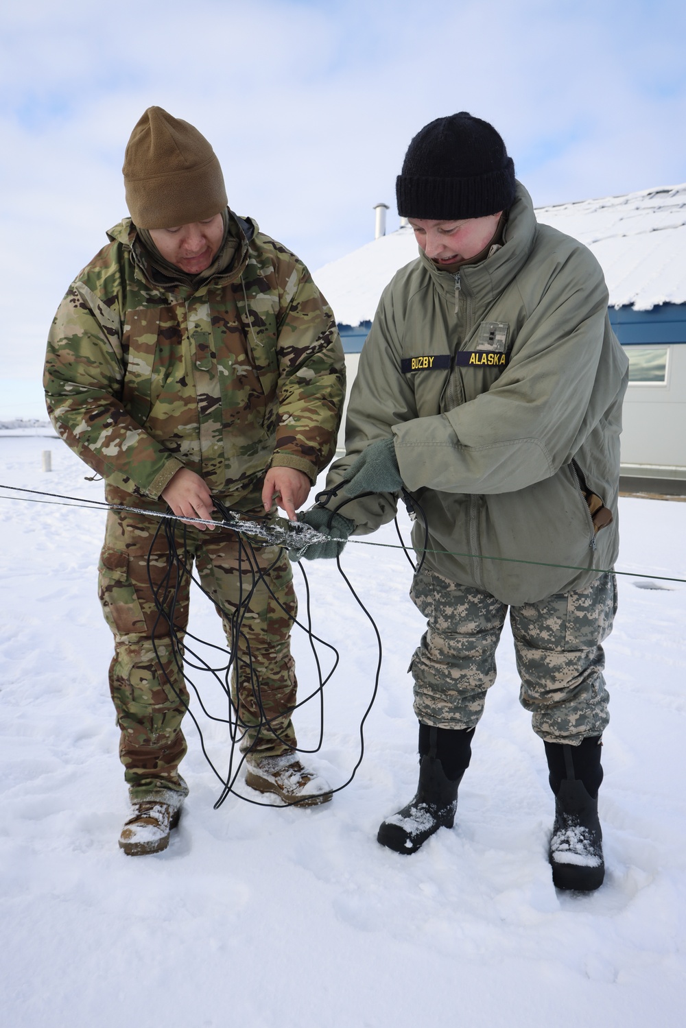 AKOM members install communication equipment during Operation Halong Response