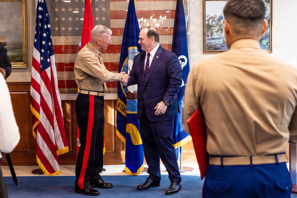 The Commandant, Gen. Eric M. Smith attends a meritorious promotion ceremony for Marines stationed around the globe