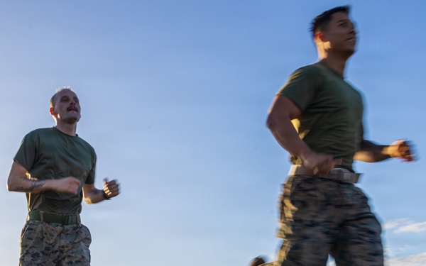 HQSVCBN MARFORPAC conducts physical training and cake cutting ceremony