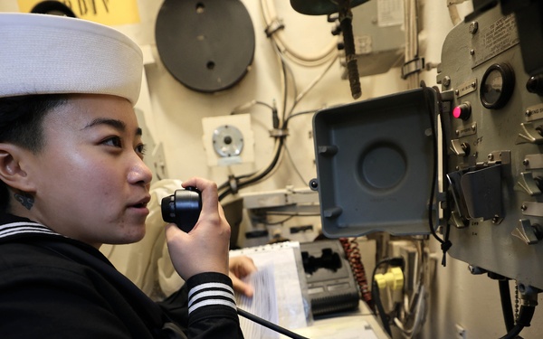 USS Roosevelt (DDG 80) Sailor Stands Quarterdeck Watch
