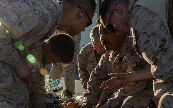 11th MEU Sailors aid a simulated casualty during RUT